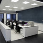 Modern office space with bright 2x2 LED Troffer Retrofit 3 CCT 18W 25W 30W RAB RTLED ceiling lights installed